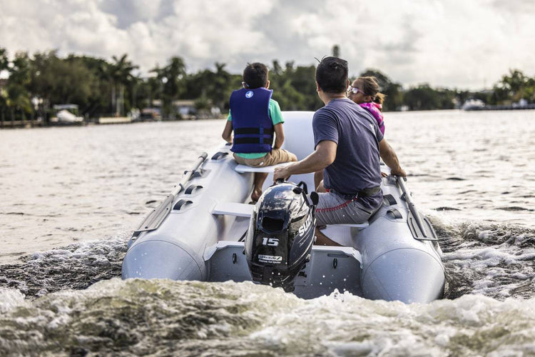 Suzuki 15 HP Black Tiller In use On Dinghy Back